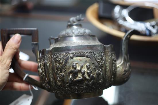 A heavy late 19th century Indian three piece silver tea set,
